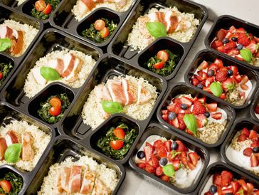 Healthy meal prep containers with colorful balanced meals